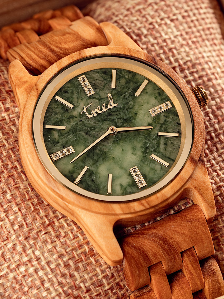Close-up of genuine green marble dial on Treed Lana olive wood watch
