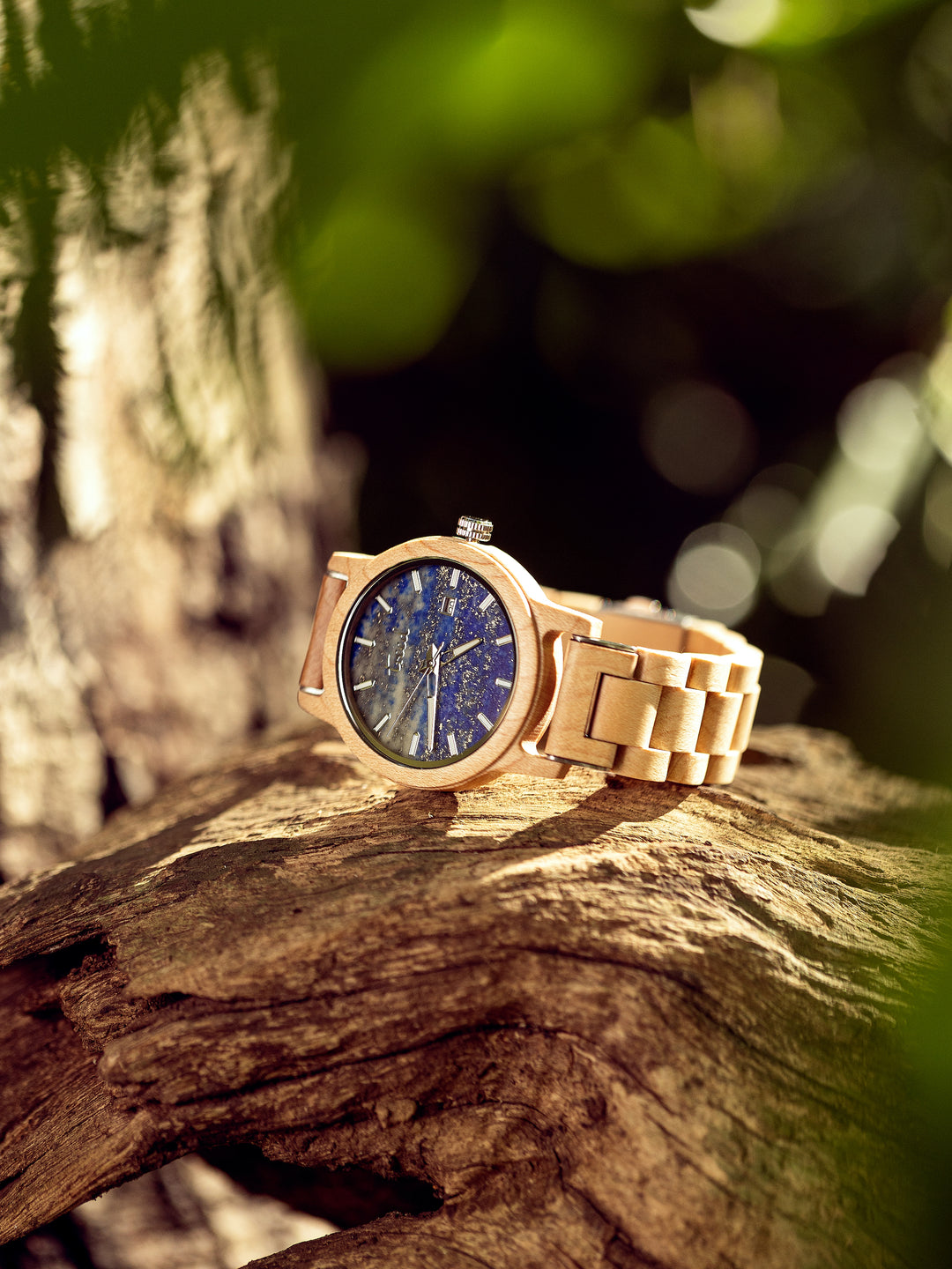 Side view of Treed Alpine Maple wooden case with lapis lazuli dial