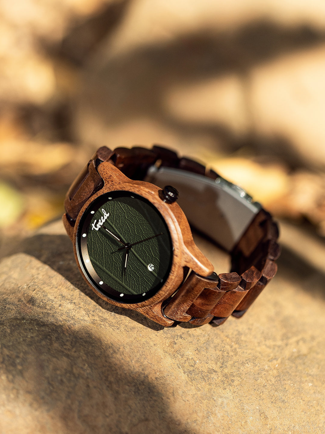 Side view of Treed GROOVE (Walnut) wooden case and crown