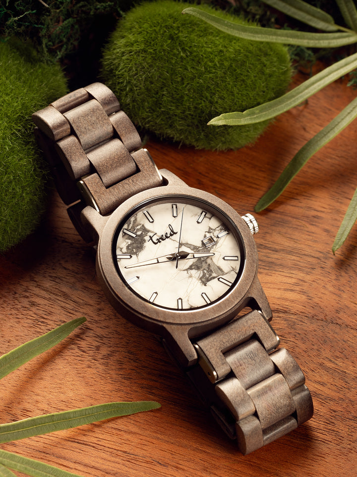 Treed Alpine Grey Maple wooden watch featuring genuine white marble dial and date display